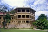 The Vimanmek Mansion is a former royal palace and is also known as the Vimanmek Teak Mansion or Vimanmek Palace.<br/><br/>

Vimanmek Mansion was built in 1900 by King Rama V (King Chulalongkorn) by having the Munthatu Rattanaroj Residence in Chuthathuj Rachathan at Ko Sichang, Chonburi, dismantled and reassembled in Dusit Garden. It was completed on March 27, 1901 and used as a royal palace by King Rama V for five years.<br/><br/>

In 1982 Queen Sirikit asked permission of King Rama IX (Bhumibol Adulyadej) to renovate Vimanmek Palace for use as a museum to commemorate King Rama V by displaying his photographs, personal art and handicrafts. The palace is the world's largest golden teakwood mansion.