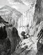China: A French expedition and porters pass an inn as they negotiate the cliffs on the route from Tong-tchouen to Mong-kou in Yunnan Province in 1868.